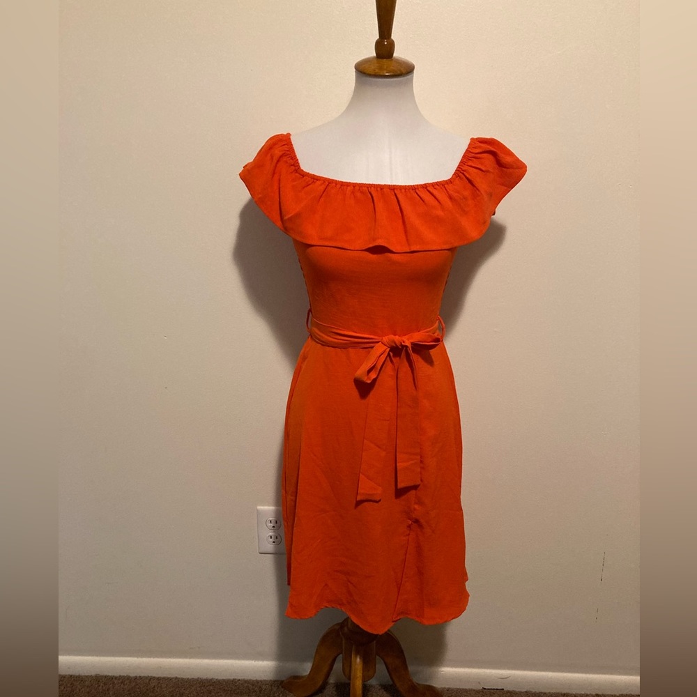 Small orange knee length dress by Monteau